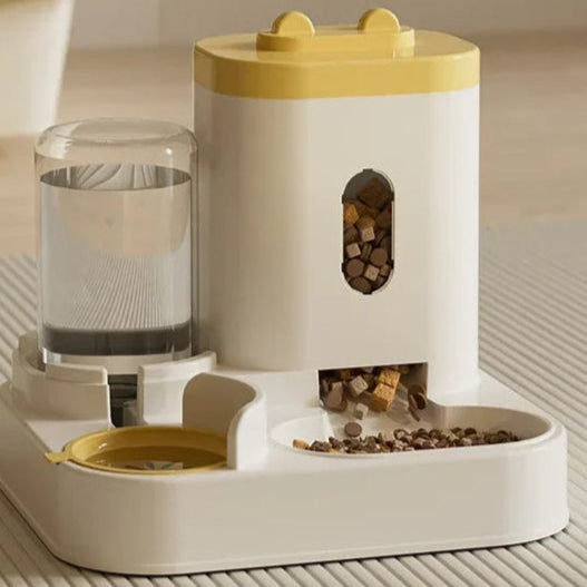 Pet feeder with water dispenser on a neutral background